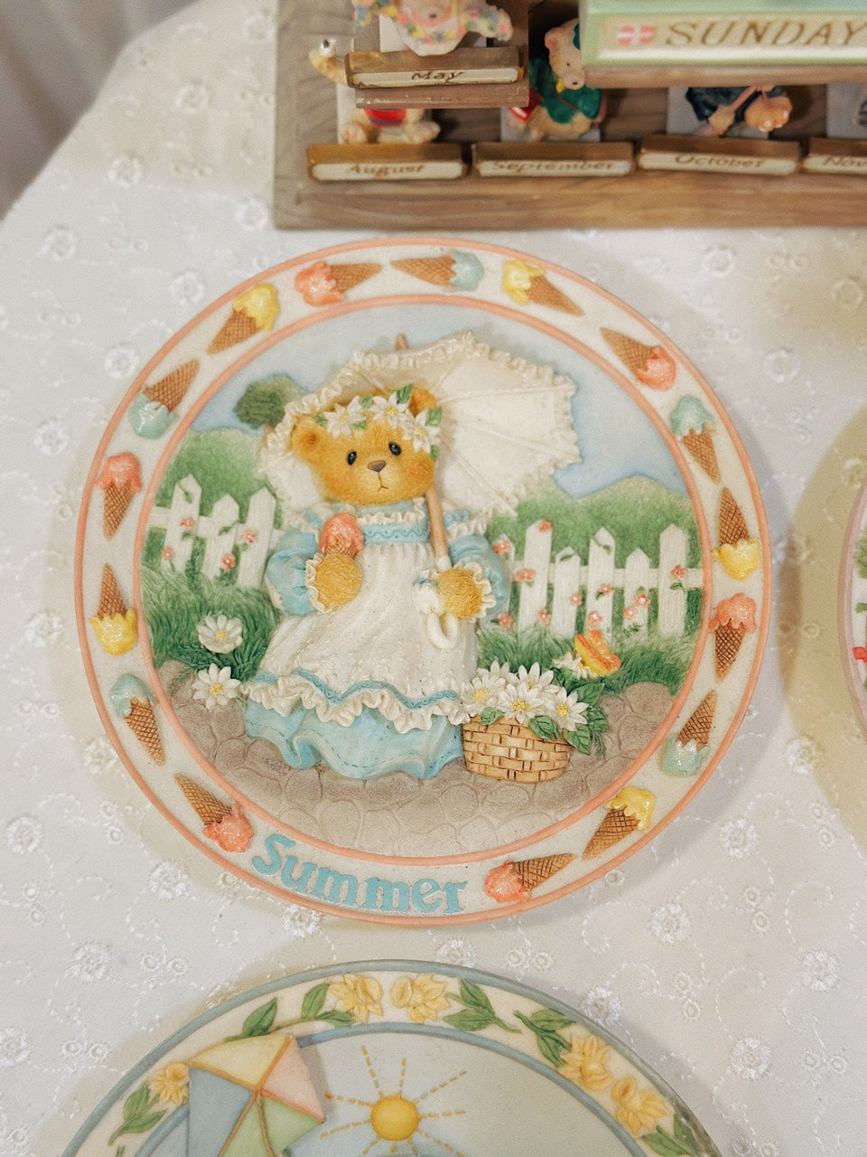 c2ada7e699a04efe17b139.jpg 1996 Cherished Teddies Four Seasons Collection Sculpted Plates - Image 1