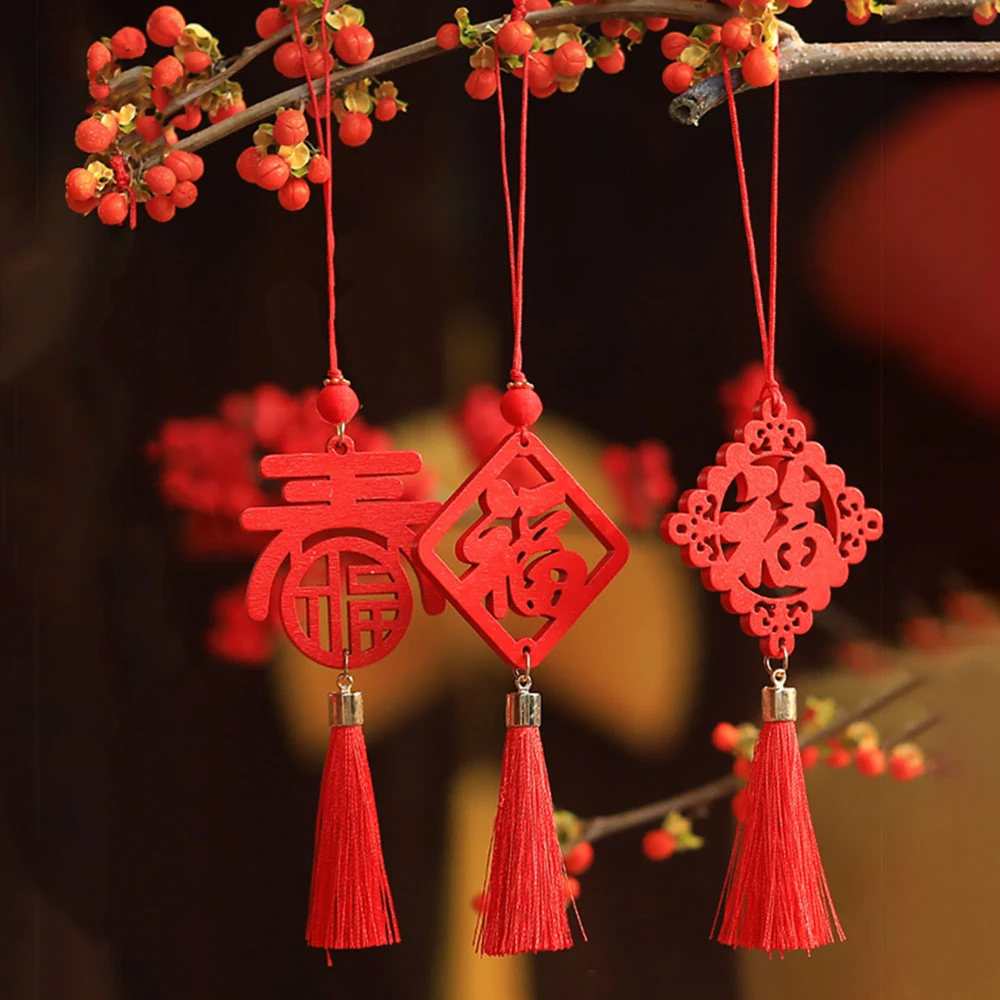 CHARM-WOODEN.jpg.webp Dây Treo Trang Trí Tết Bằng Gỗ Tua Rua Đỏ - Image 1