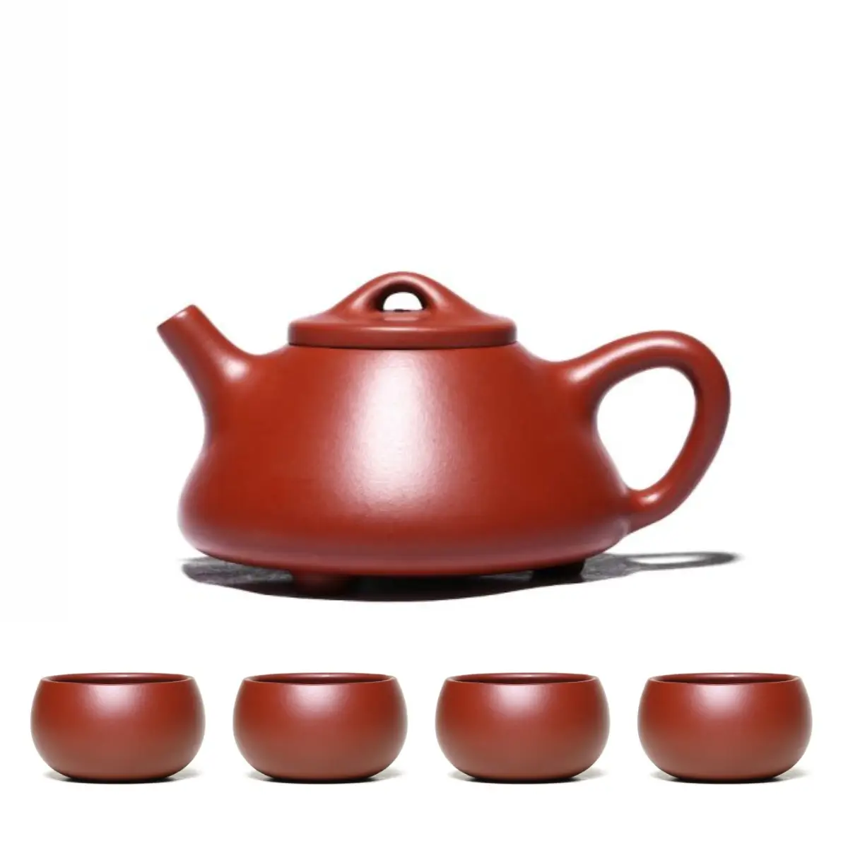bo-am-tu-sa-thach-bieu-canh-chu-4-chen.webp Bộ Ấm Tử Sa Thạch Biều Cảnh Chu 240ml + 4 Chén - Image 1